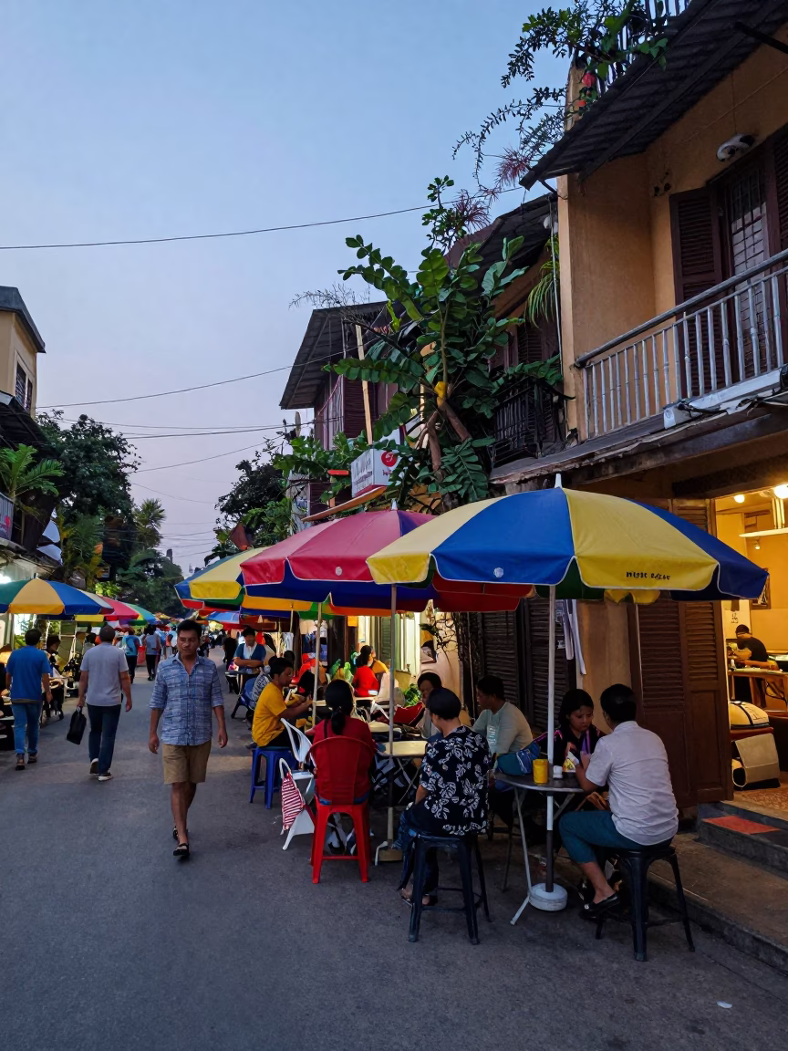 Hanoi Vietnam Nautical Dawn Street Scene with Umbrellas and Local Life in in Hanoi, Vietnam