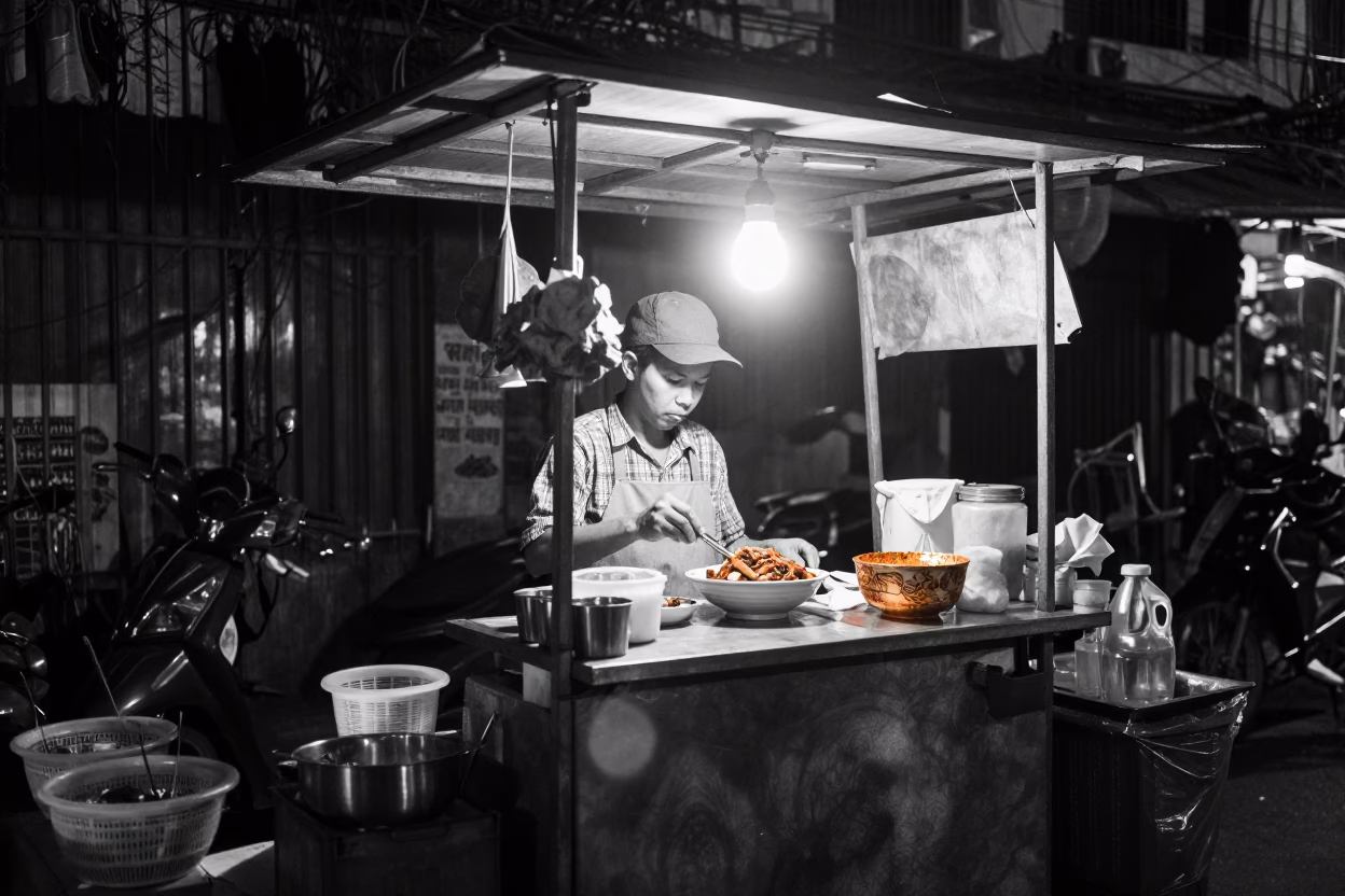 Hanoi Vietnam Night Street Scene with Bibim Guksu Plate and Weathered Tray Corner in in Hanoi, Vietnam