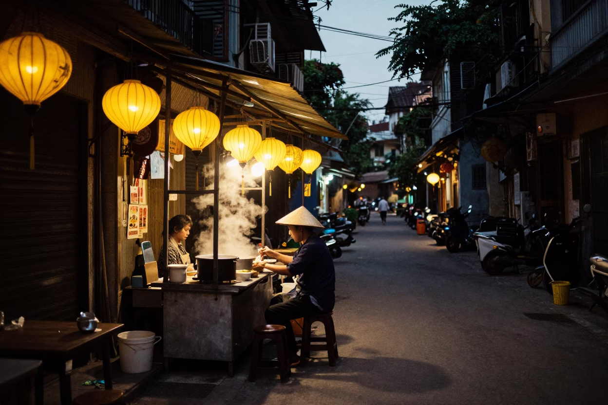 Hanoi Vietnam Predawn Street Scene with Lanterns and Early Morning Vendors in in Hanoi, Vietnam