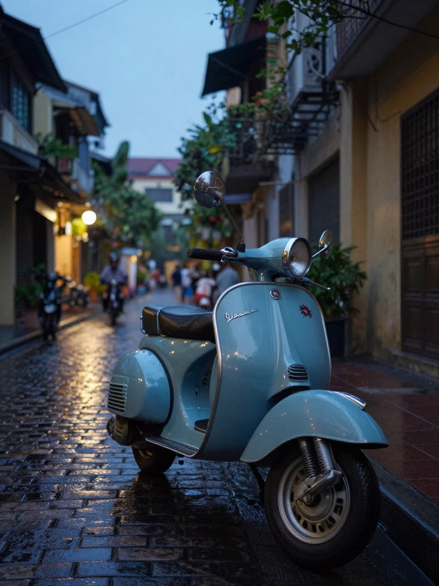 Hanoi Vietnam Twilight Street Scene with Vintage Vespa on Cobblestone Lane in in Hanoi, Vietnam