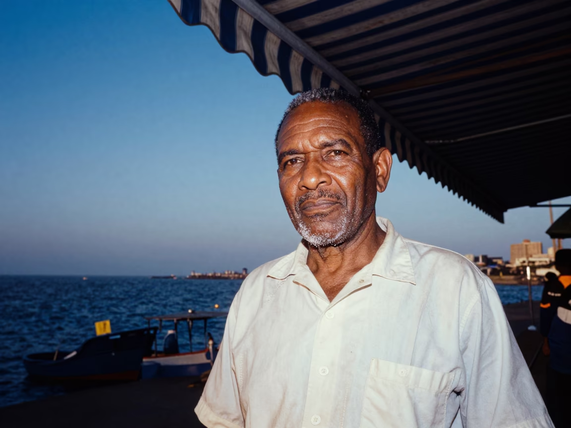Harbor Pilot Portrait Blue Hour Durban in under a striped market awning near Durban