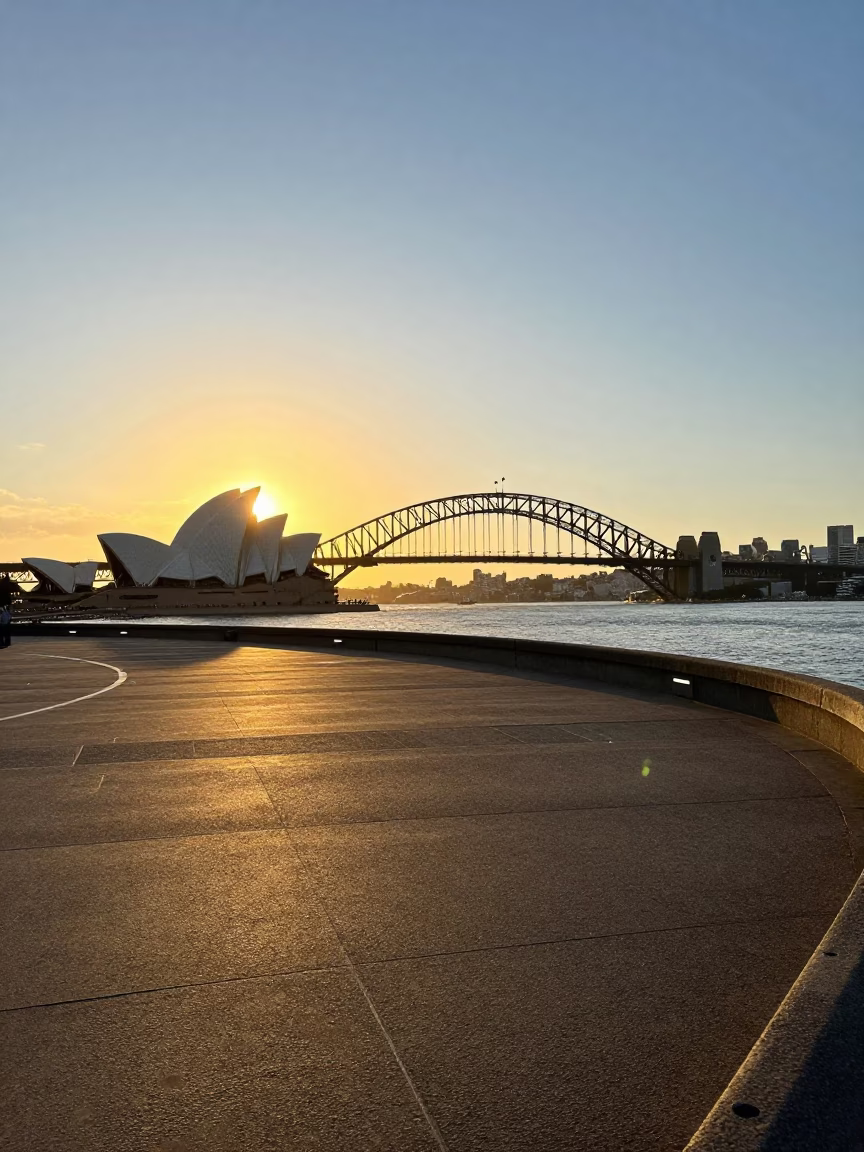 Harbour Bridge And Opera House From Circular Quay Wharf in Sydney at Golden Hour in in Sydney, New South Wales, Australia