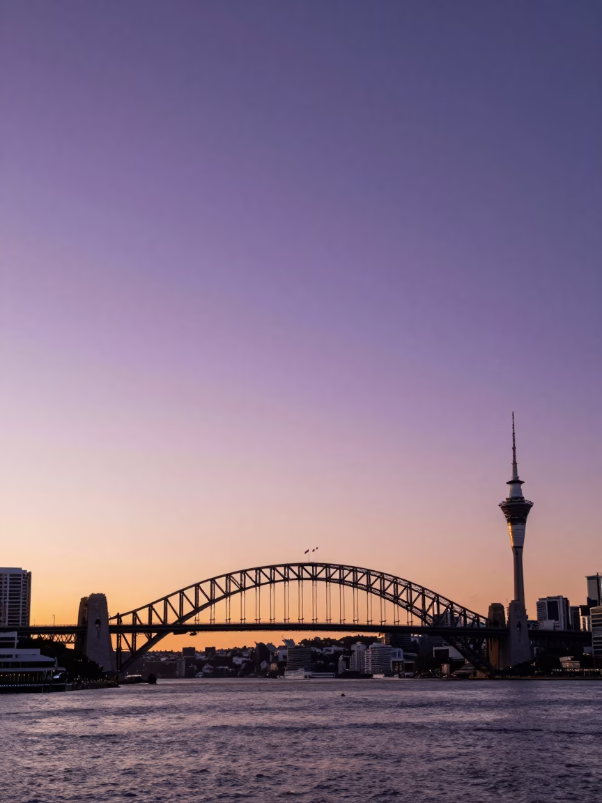 Harbour Bridge And Sky Tower From Viaduct Harbour Waterfront Promenade in Auckland in in Auckland, New Zealand