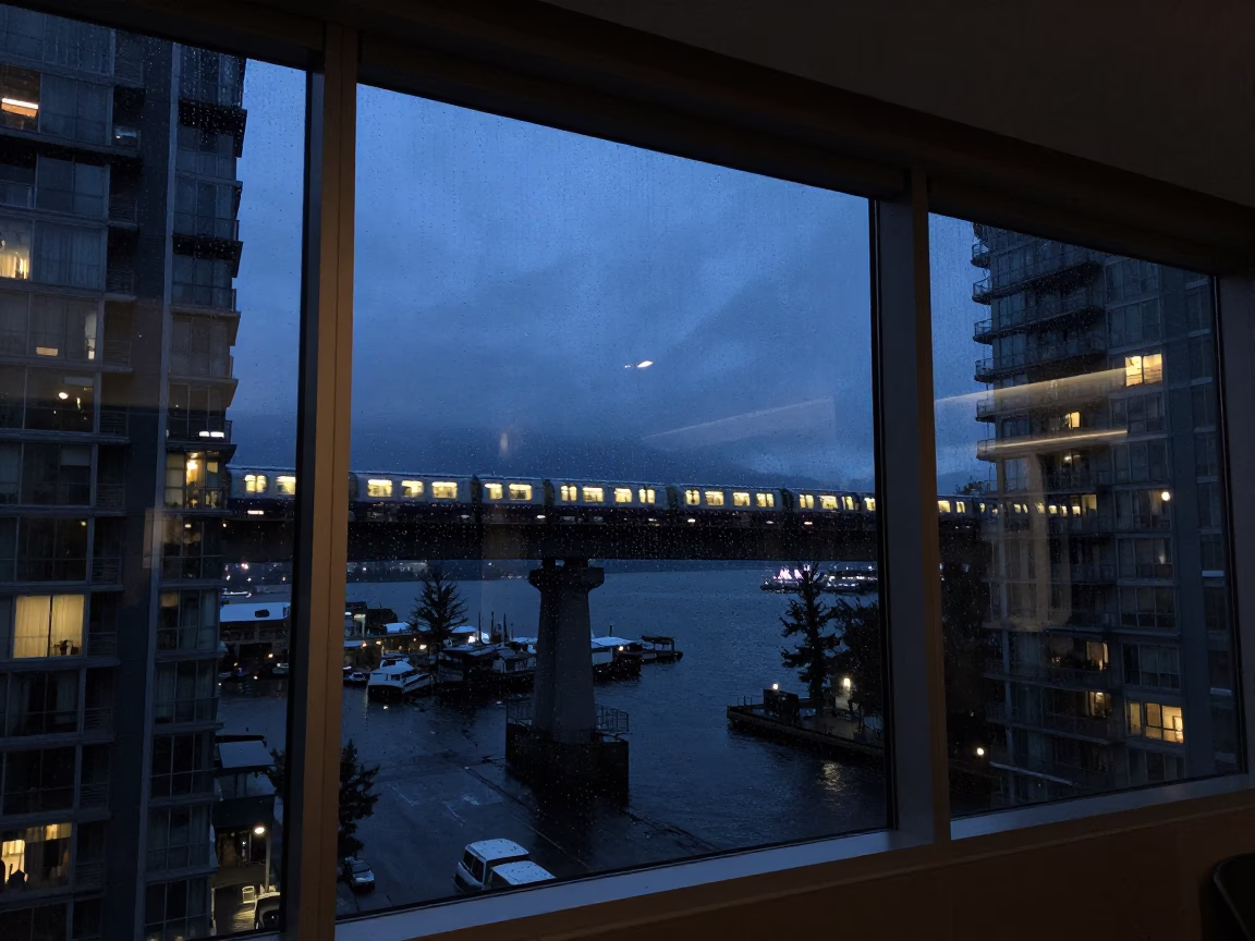 Harbour From Interior Window in Vancouver at Midnight Light in in Vancouver, British Columbia, Canada