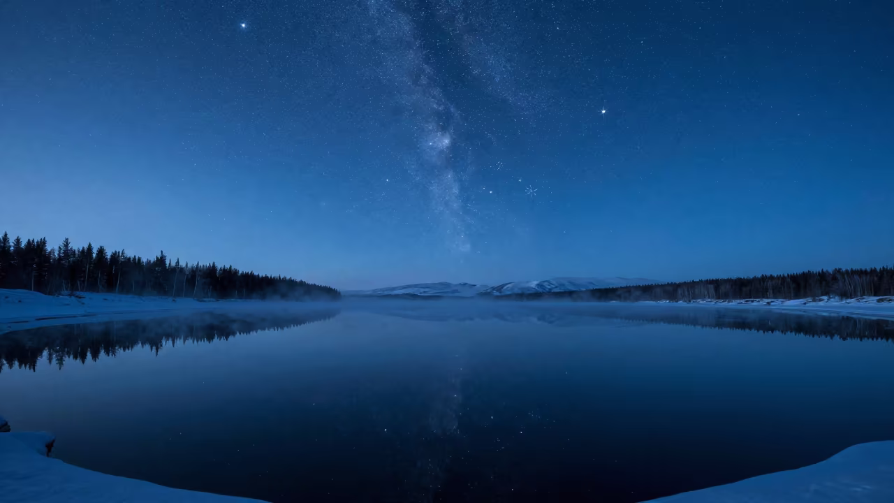 Hard Stars Over Frozen Alaskan Reservoir Twilight in beneath a hard winter sky over snowfields near Anchorage