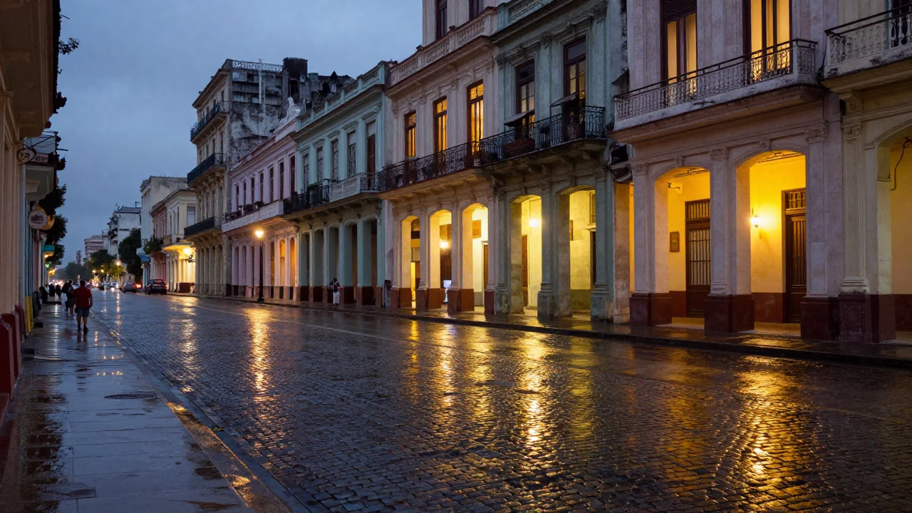 Havana Cuba Evening Street Scene With Wet Pavement Reflections And Vintage Cars in in Havana, Cuba