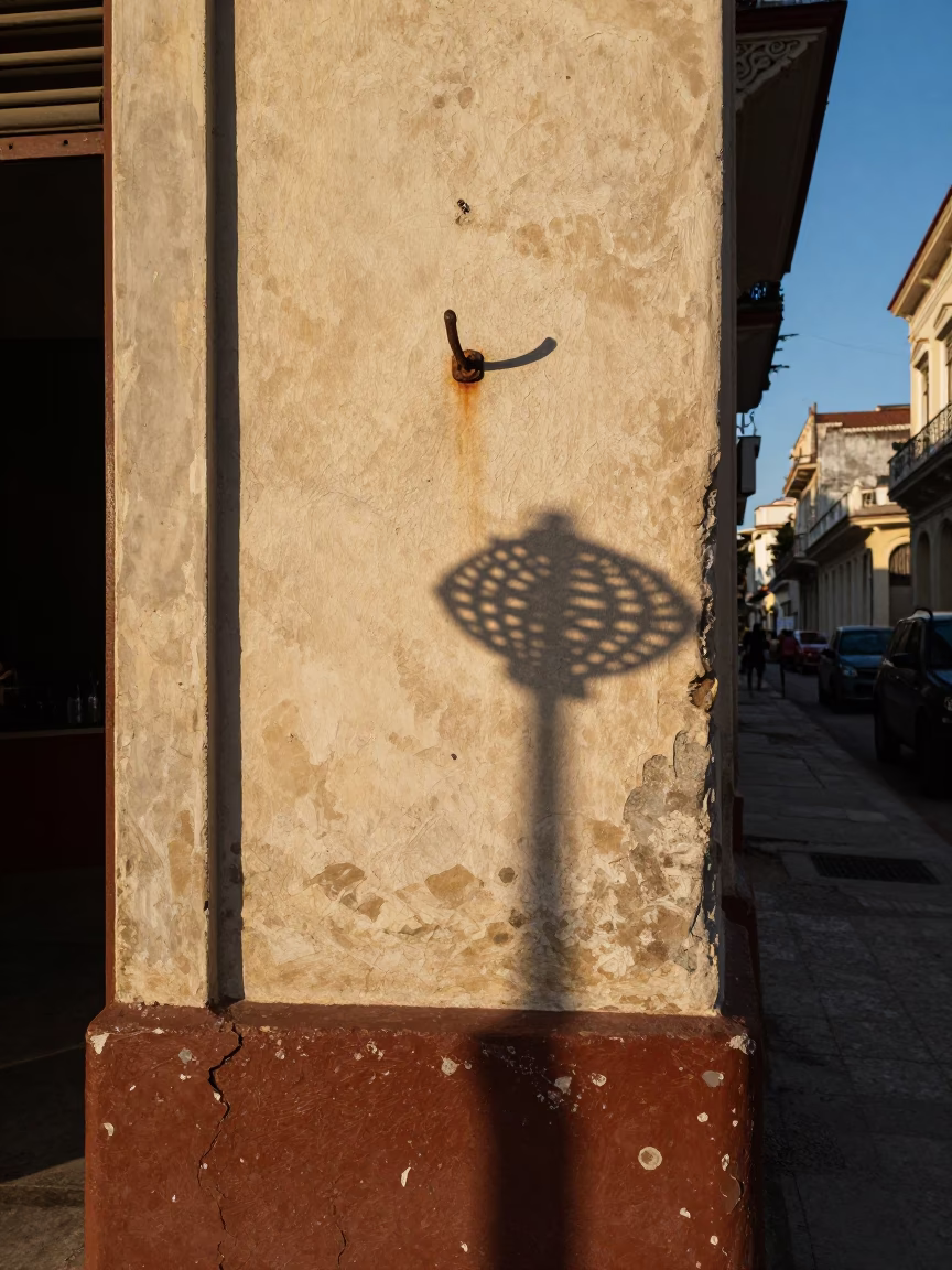 Havana Cuba Late Afternoon Street Scene with Wicker Shadow and Coat Hook in in Havana, Cuba