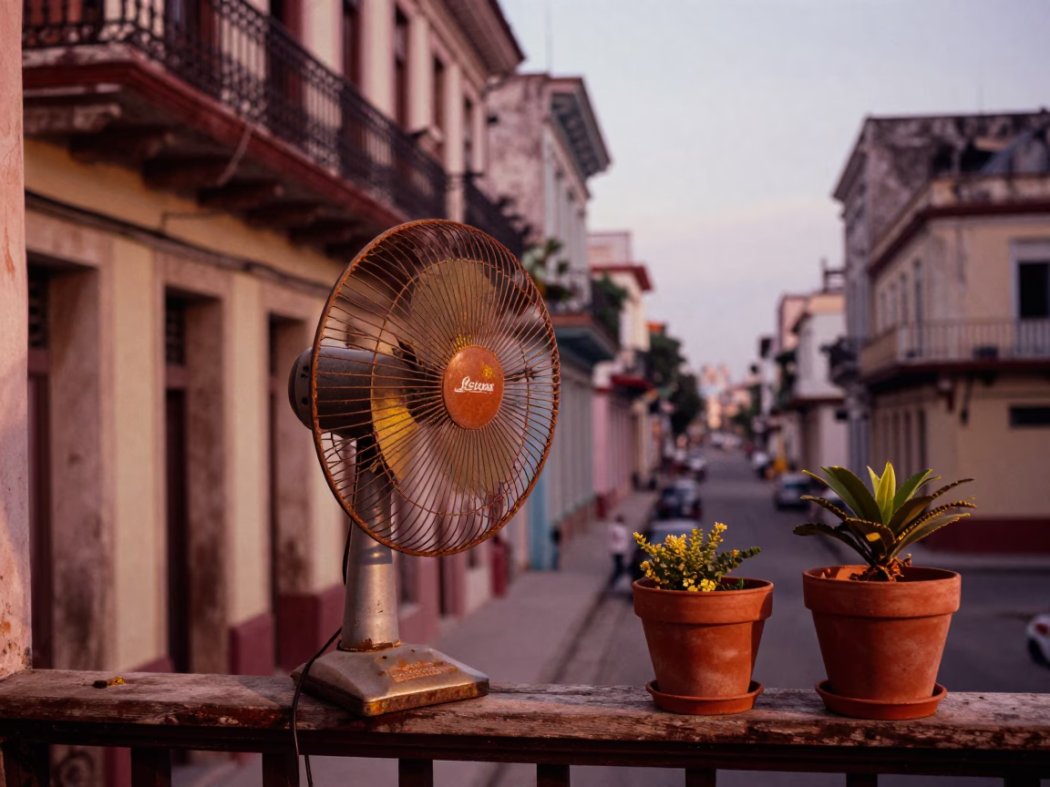 Havana Cuba street scene before dusk with table fan and houseplants in warm light in in Havana, Cuba