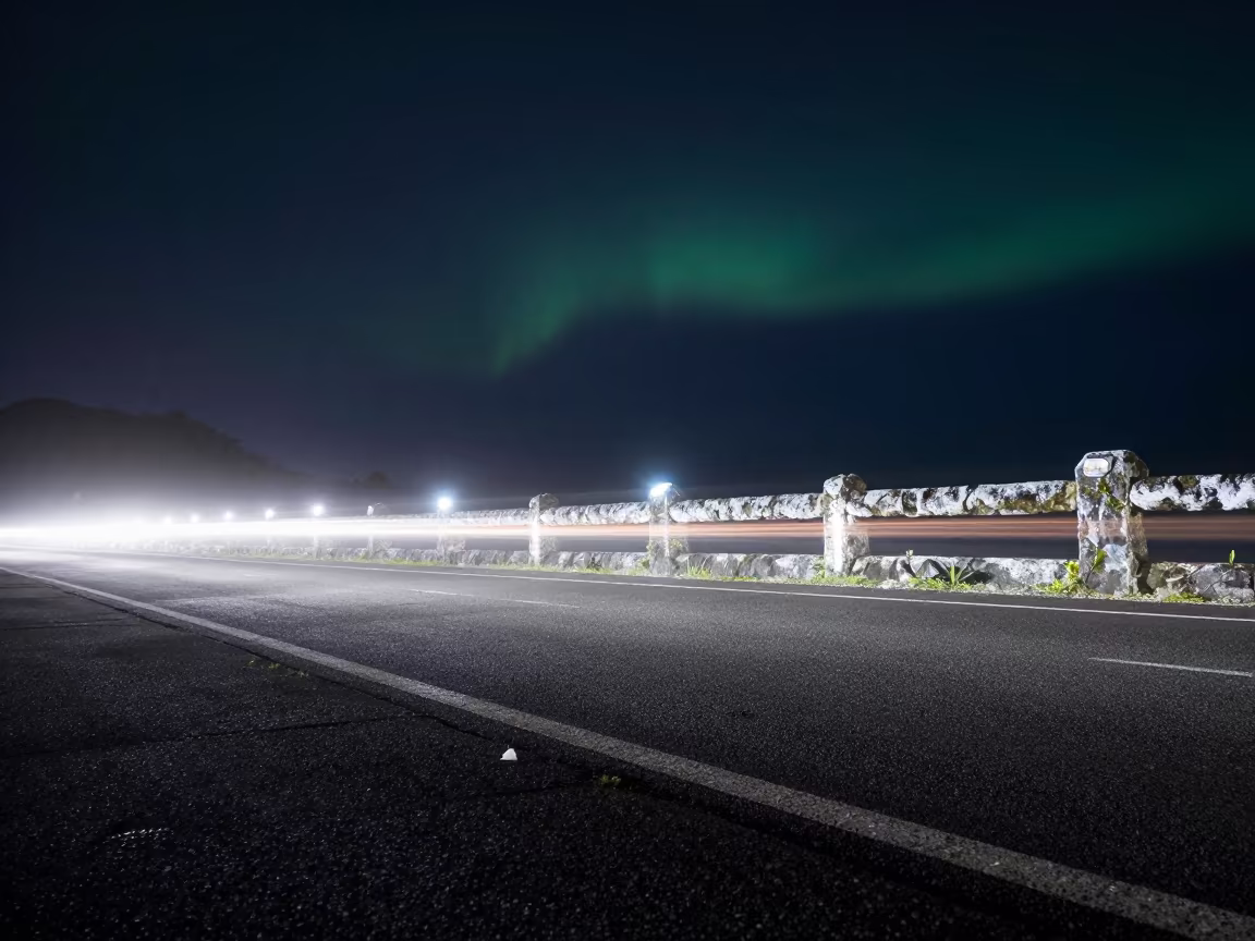 Headlight Trails Beside Salt Spray Fiji Night in beneath a dark-sky overlook in Fiji
