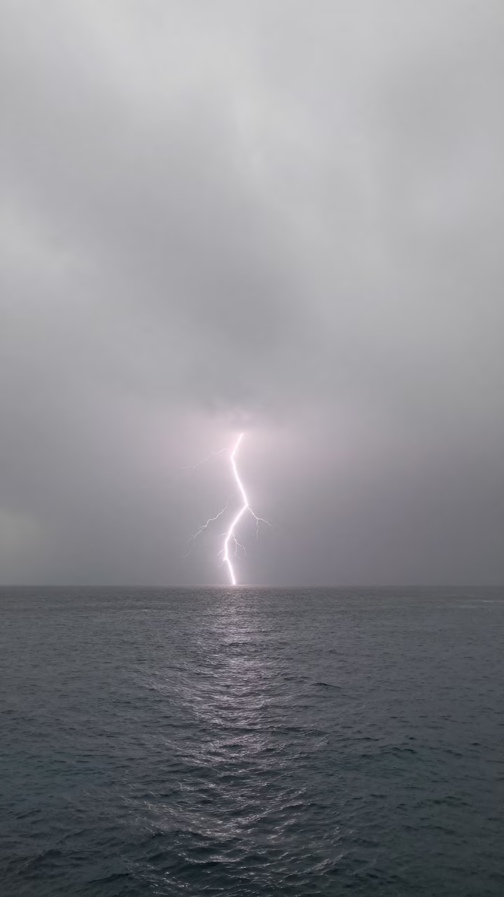 Heat Lightning Over Tobruk Monsoon Fog in through low marine fog near Tobruk