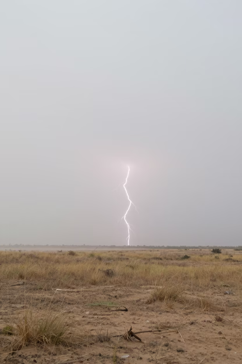 Heat Lightning on Senegal Storm Horizon in across a storm-bright plain in Senegal