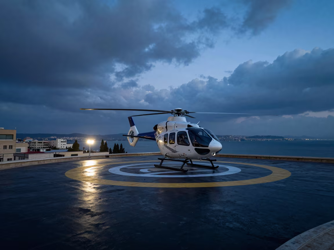 Helicopter Approaches Beersheba Rooftop Helipad at Dusk in on a hospital rooftop helipad in Beersheba