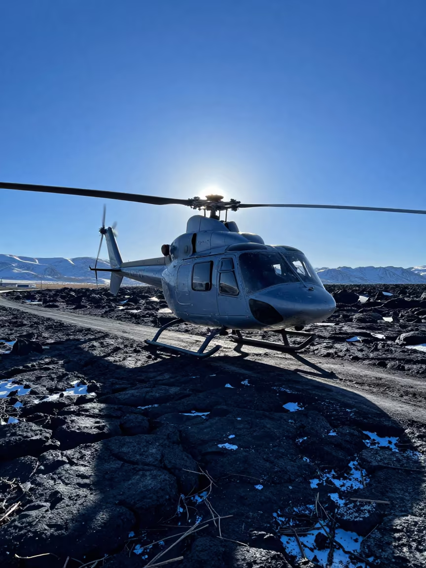 Helicopter Over Black Lava Field in Blue Evening Light in on a wind-open causeway near Lhasa