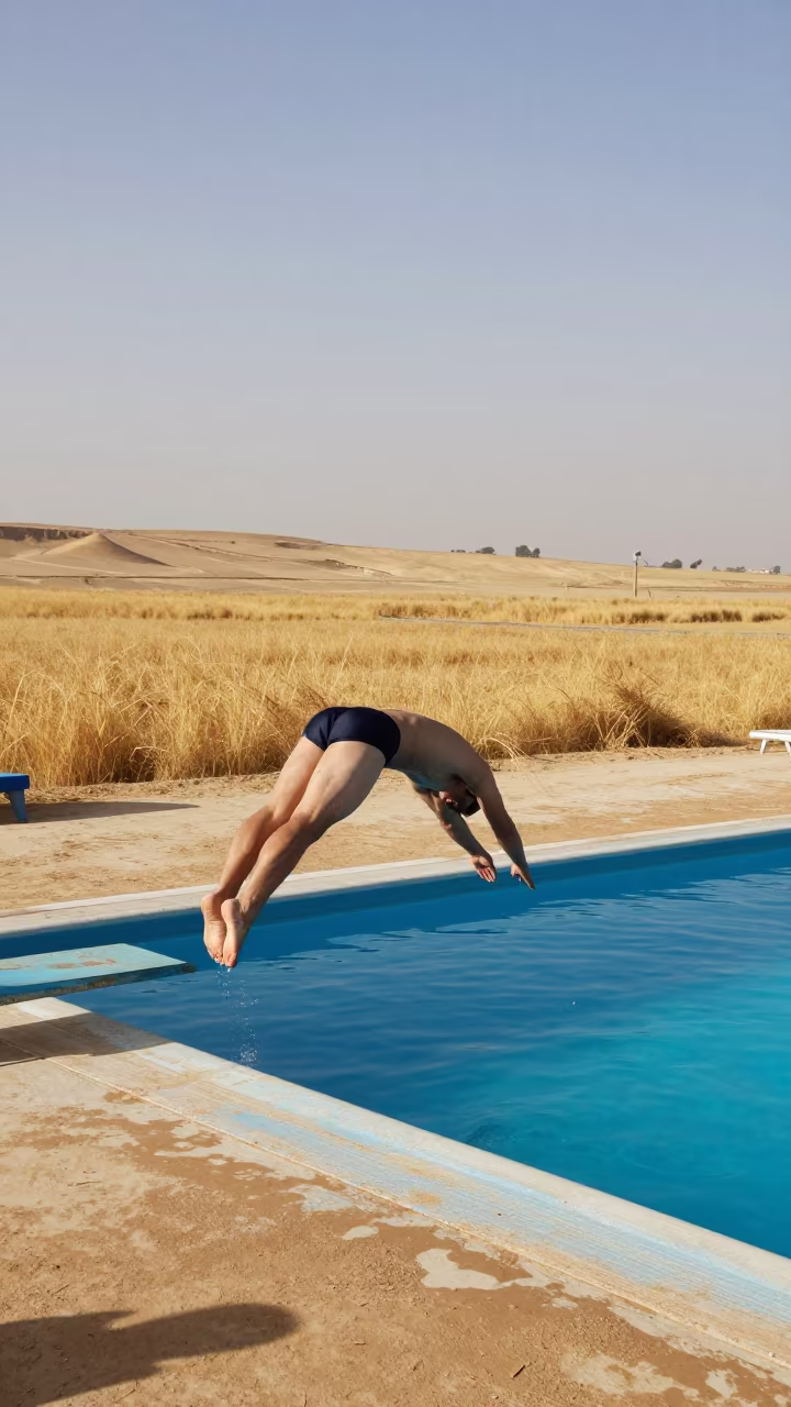 High Diver Pike Pose Over Pool Near Giza Fields in near open fields near Giza