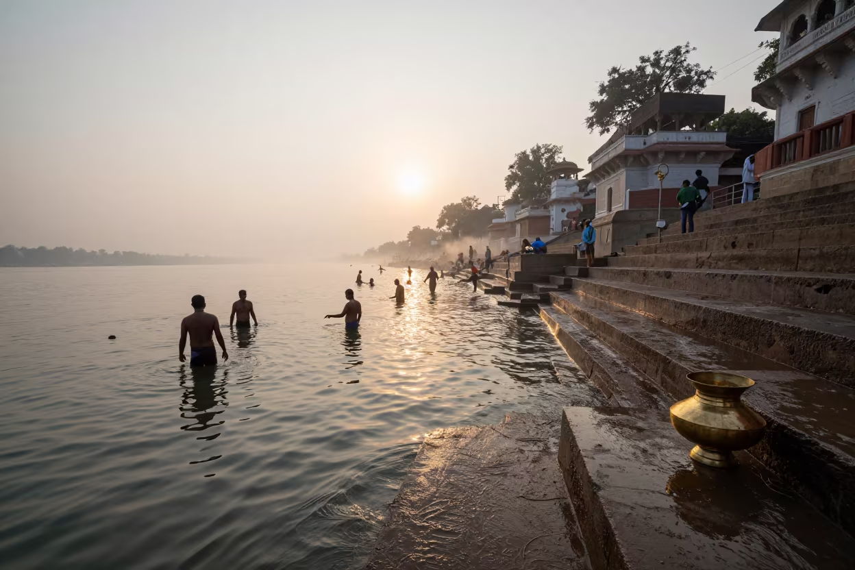 Hindu Bathers at Dawn on Sacred Ghat Steps in in a temple courtyard in India