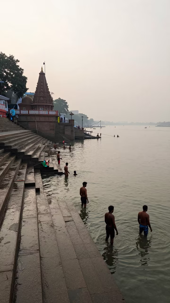 Hindu Bathers at Kolkata Ghats at Dawn in in a temple courtyard in Kolkata