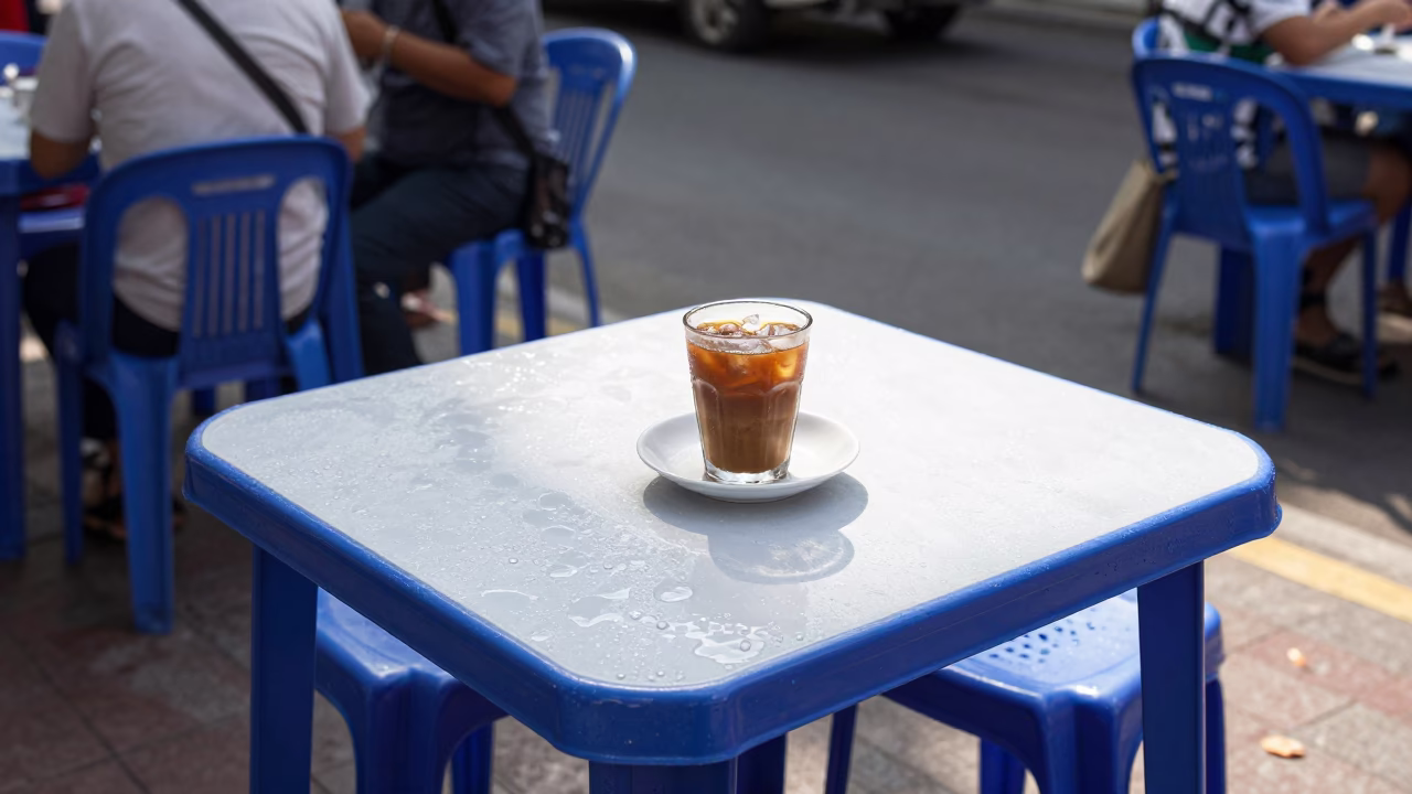 Ho Chi Minh City Noon Street Scene Condensation on Plastic Table Blue Bowl in in Ho Chi Minh City, Vietnam