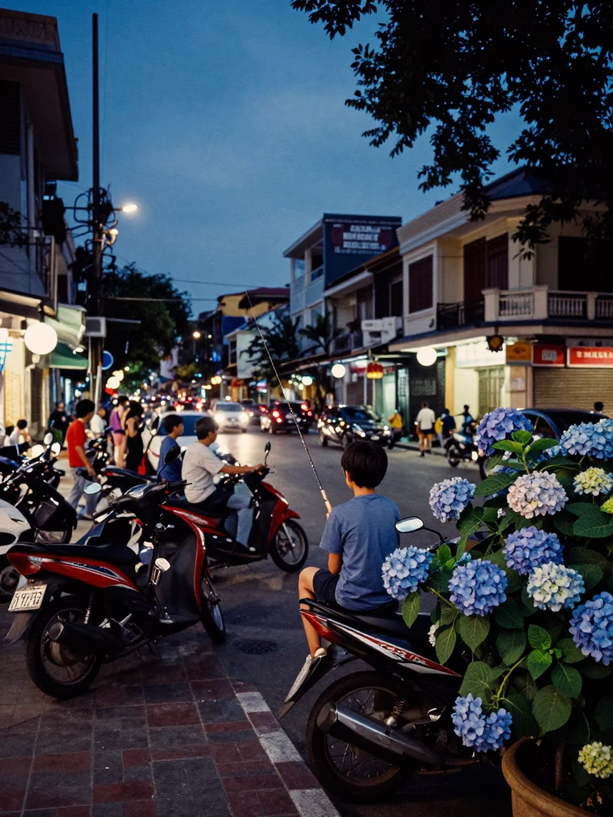 Ho Chi Minh City Twilight Street Scene with Boy Fishing and Hydrangea Bush in in Ho Chi Minh City, Vietnam