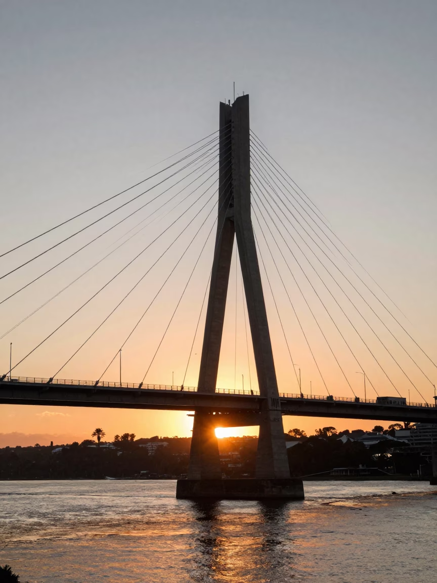 Hobart Bridge Illuminated at As The Sun Drops Toward The Horizon in in Hobart, Tasmania, Australia