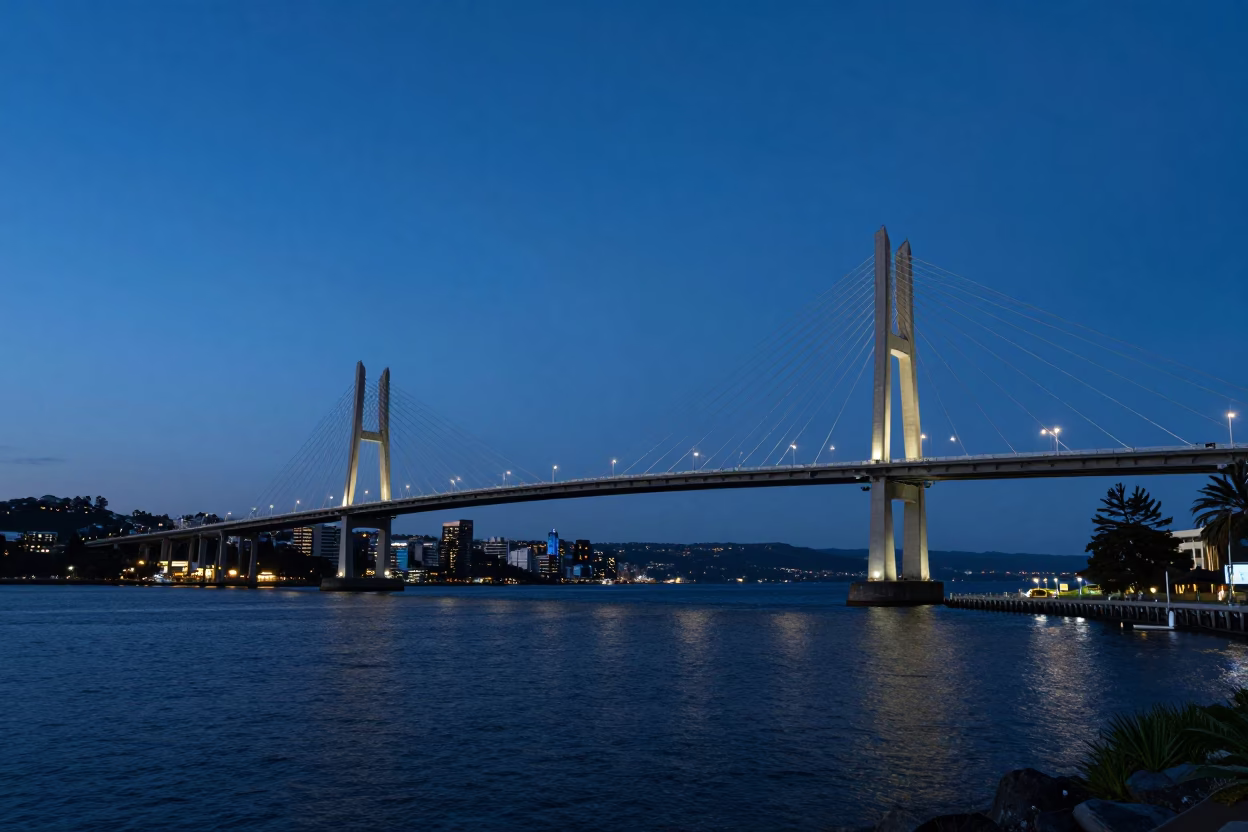 Hobart Tasmania Cable Bridge Illumination at Dusk with Urban Harbor Life in in Hobart, Tasmania, Australia