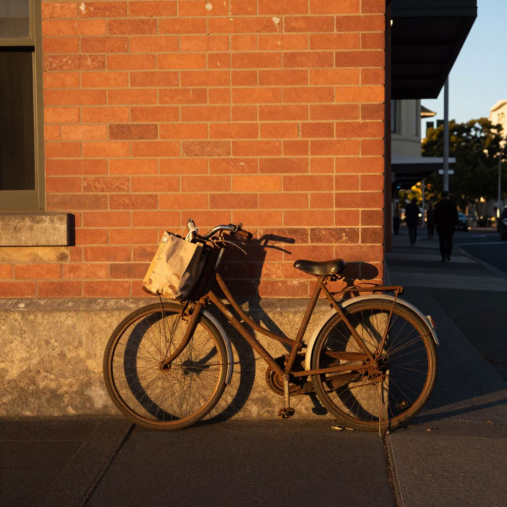 Hobart Tasmania evening street scene with vintage bicycle and terracotta pot in honeyed light in in Hobart, Tasmania, Australia