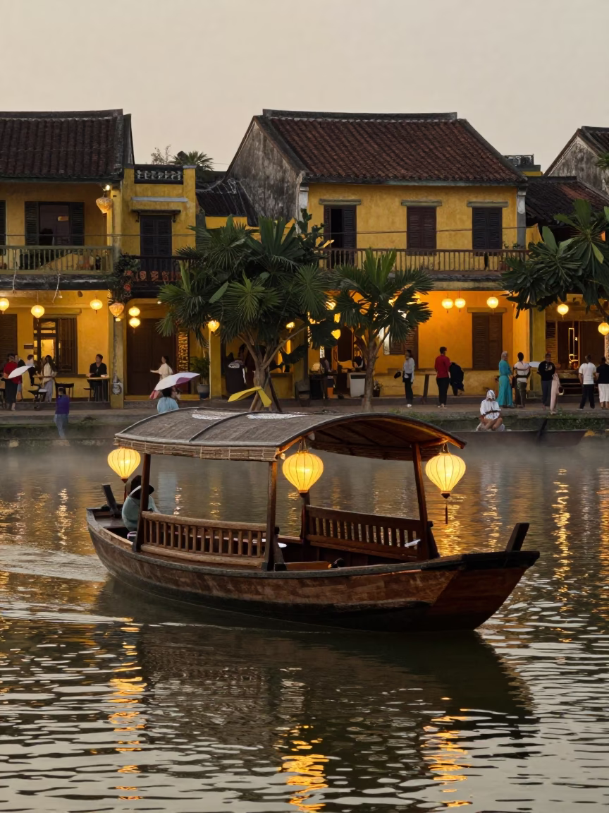 Hoi An Vietnam Early Evening Sampan on Misty River with Lanterns and Traditional Architecture in in Hoi An, Vietnam