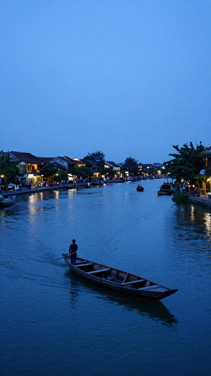 Hoi An Vietnam Evening Blue Hour River Scene with Traditional Boat in in Hoi An, Vietnam