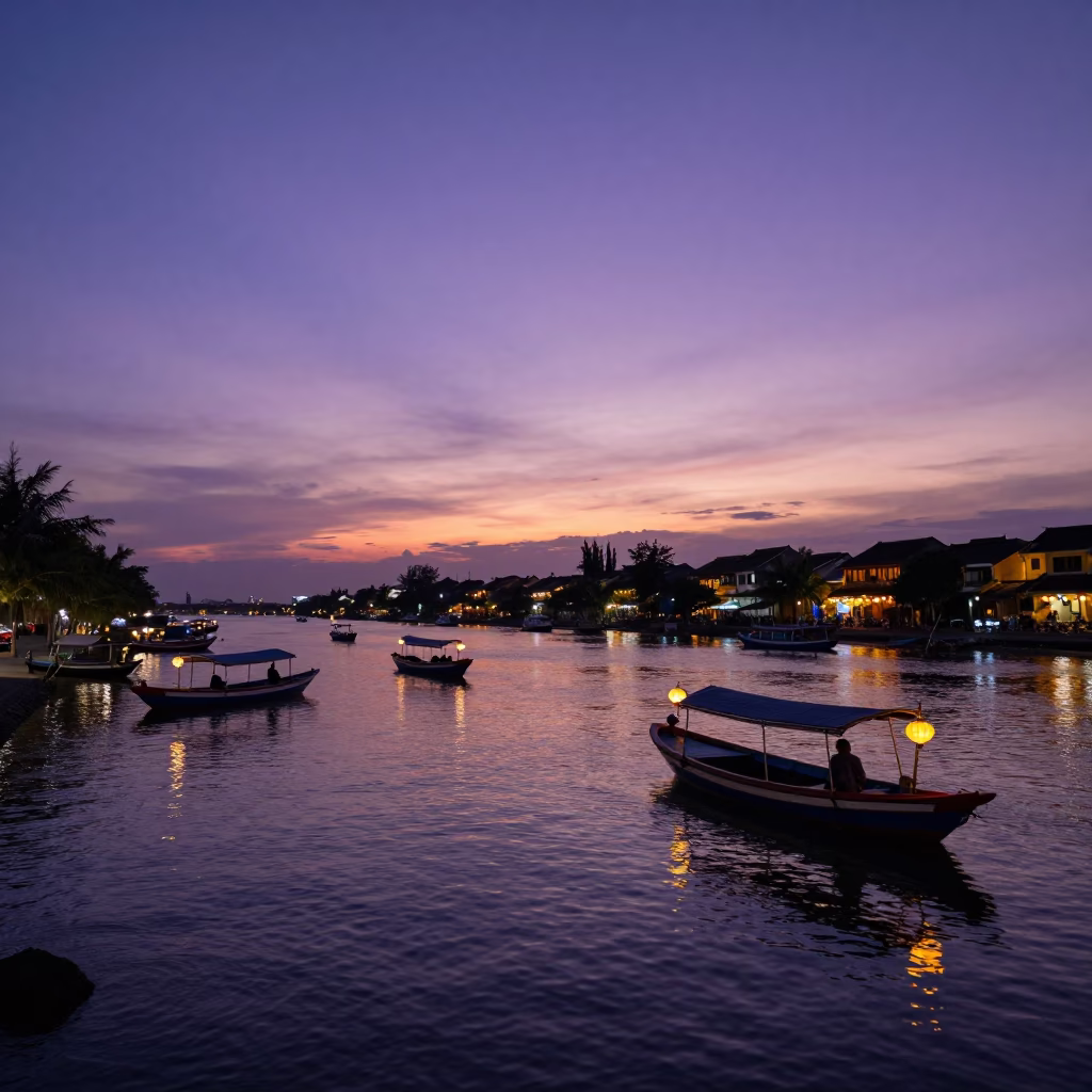 Hoi An Vietnam River Sunset with Fishing Boats and Lanterns in in Hoi An, Vietnam