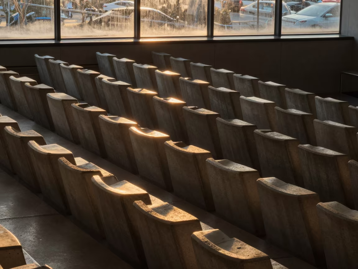 Honey Light on Concrete Seats Above in inside a ribbed concrete lobby near Villa Canales