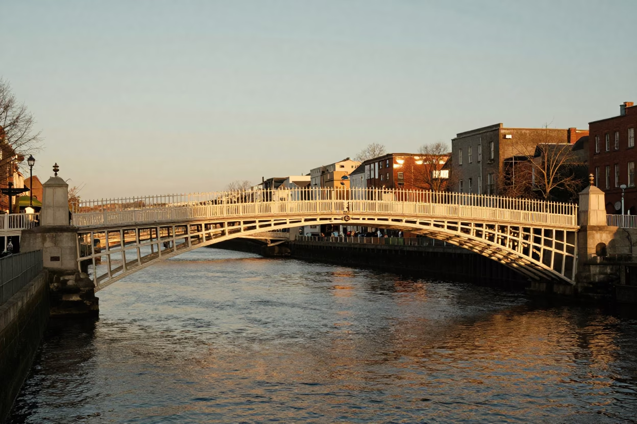Honeyed Evening Light on Ha'penny Bridge And River Liffey in Dublin in in Dublin, Ireland