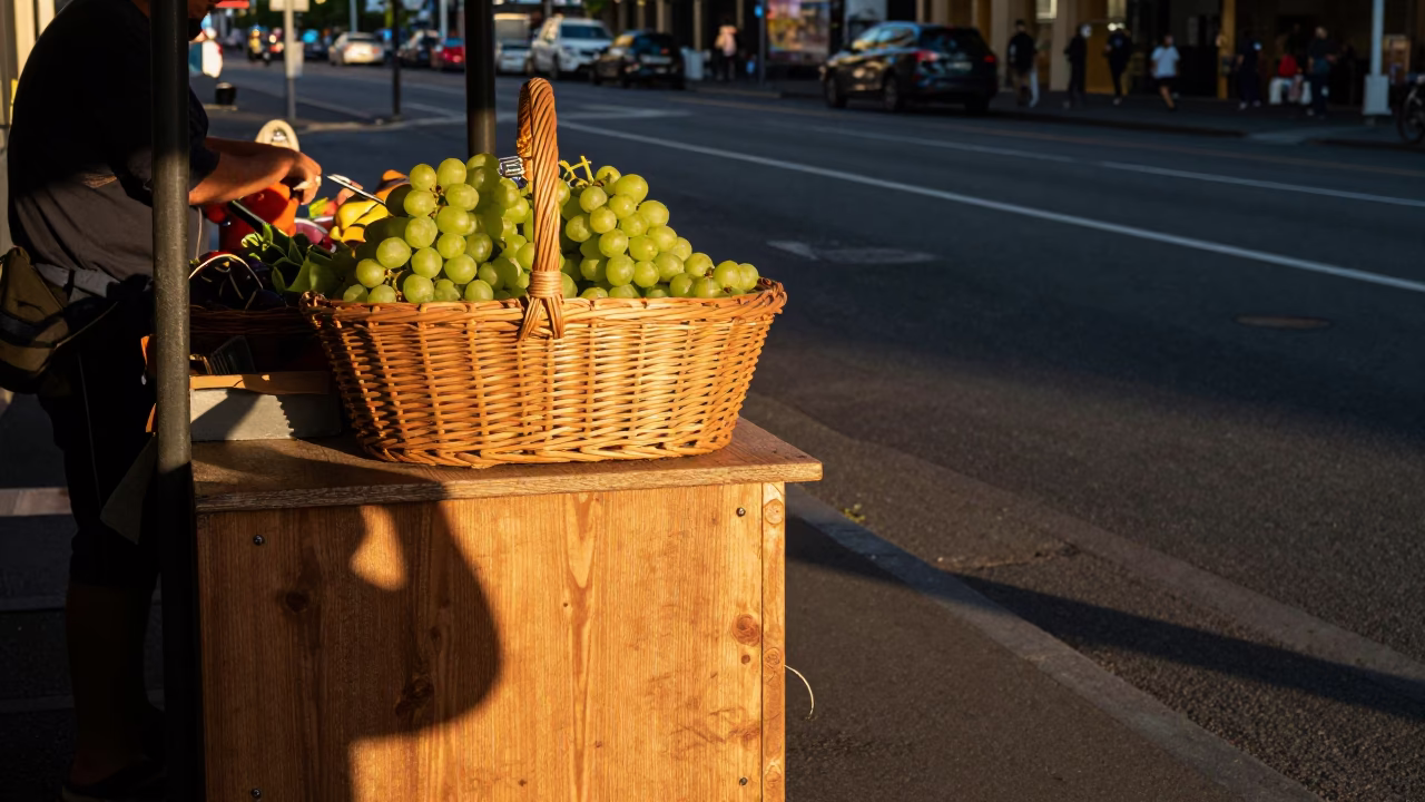 Honeyed Evening Light on Melbourne Street Corner with Grapes and Wicker Shadow in in Melbourne, Victoria, Australia