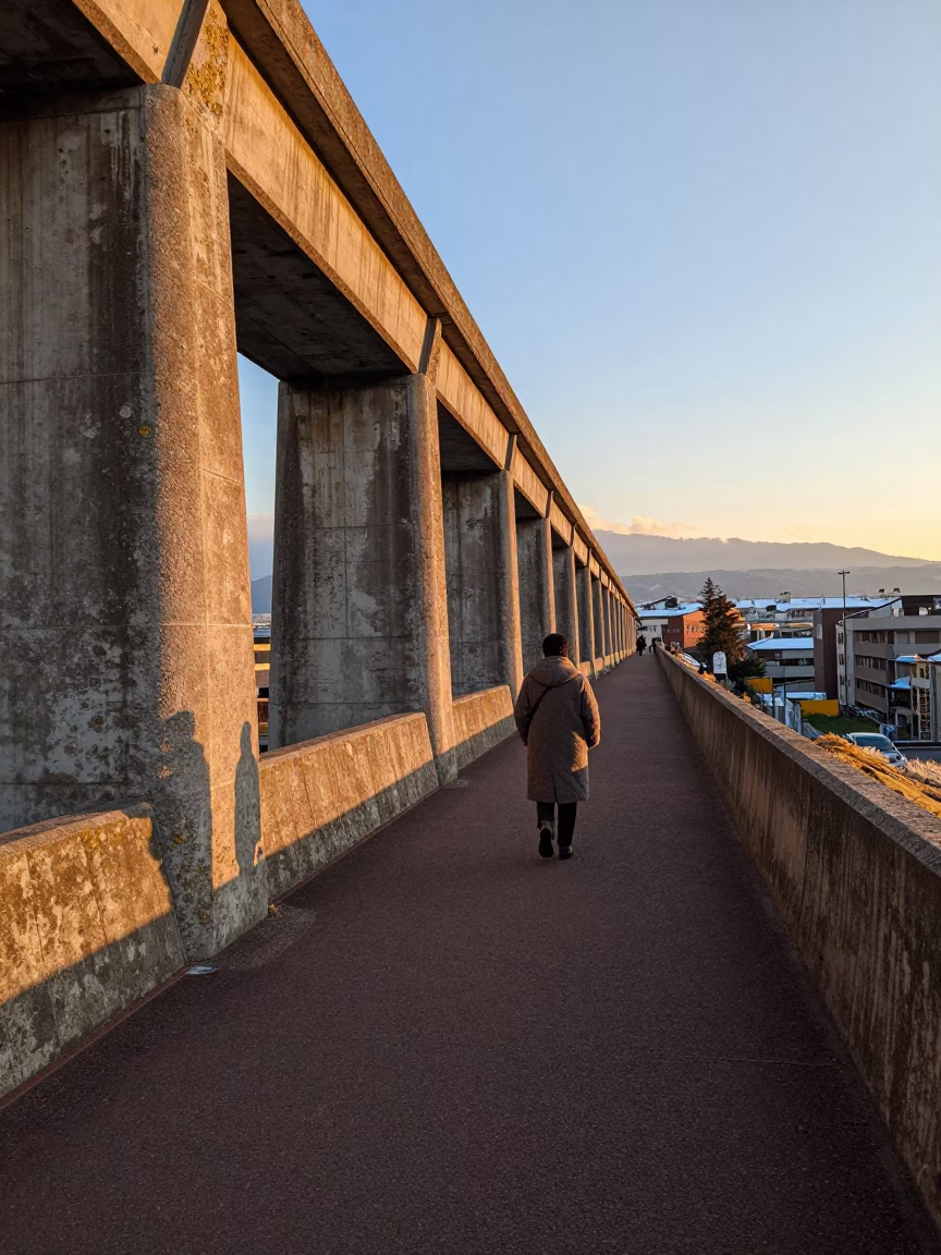 Honeyed Evening Light on Sapporo Aqueduct Maintenance Path with Lichen Bright Parapets in in Sapporo, Japan