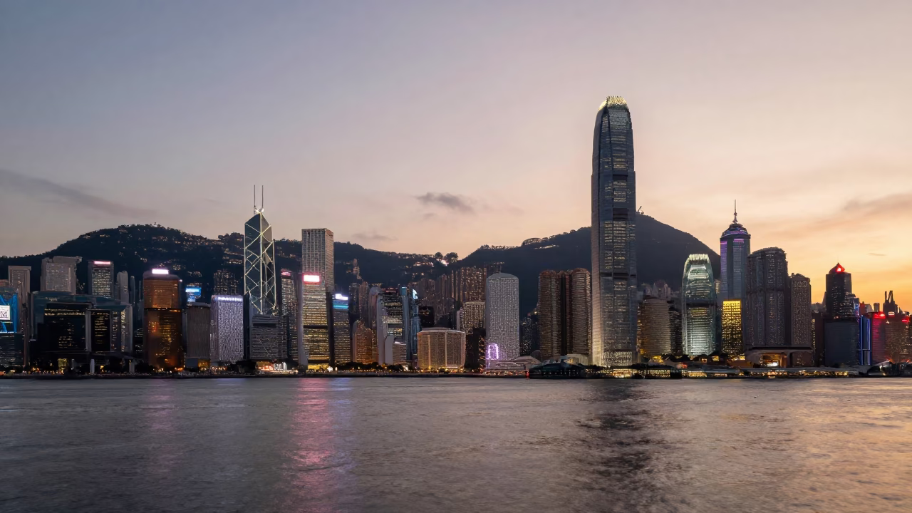 Honeyed Evening Light Over Hong Kong Skyline and Victoria Harbour Pedestrian Bridge in in Hong Kong, Hong Kong
