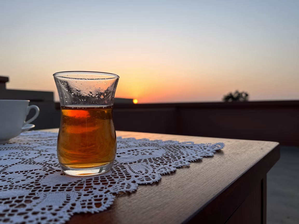 Honeyed Evening Tea on Lace Tablecloth Near Rajkot in on a bedside table near Rajkot