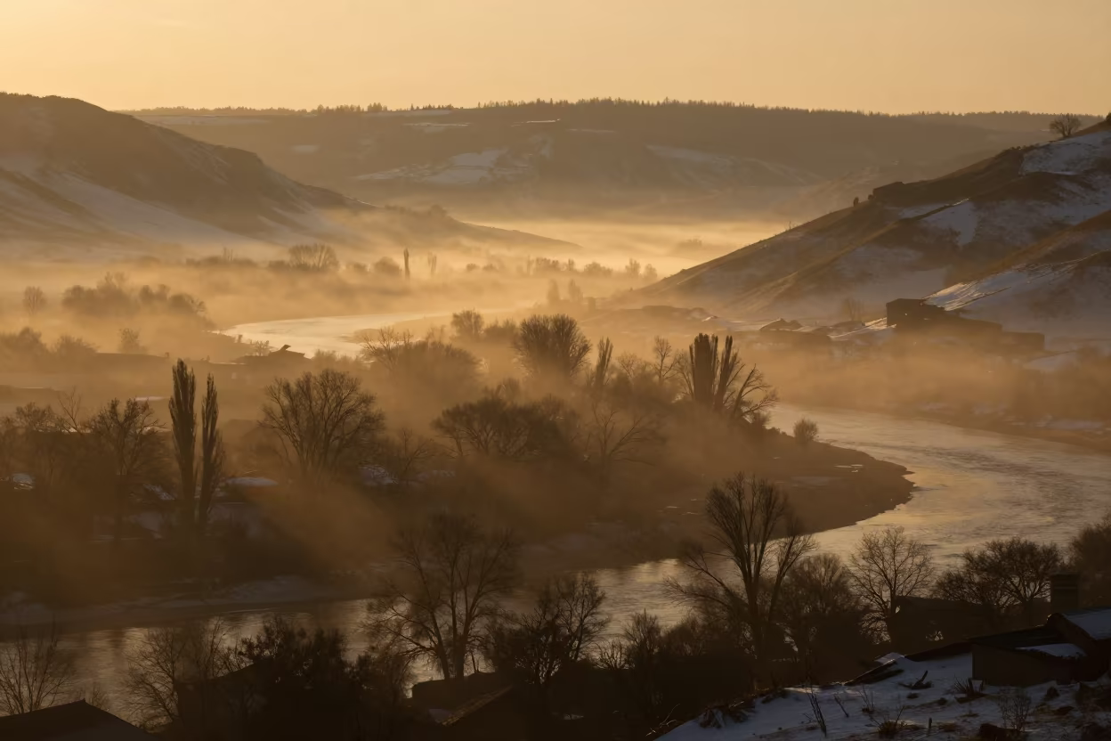 Honeyed Winter Fog Over Almaty River Valley in through low marine fog near Almaty