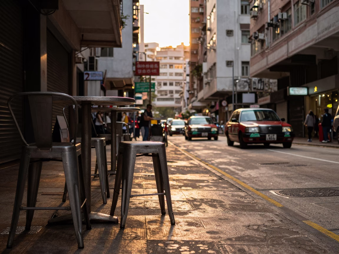 Hong Kong Evening Street Scene with Metal Stools and City Life in in Hong Kong, Hong Kong