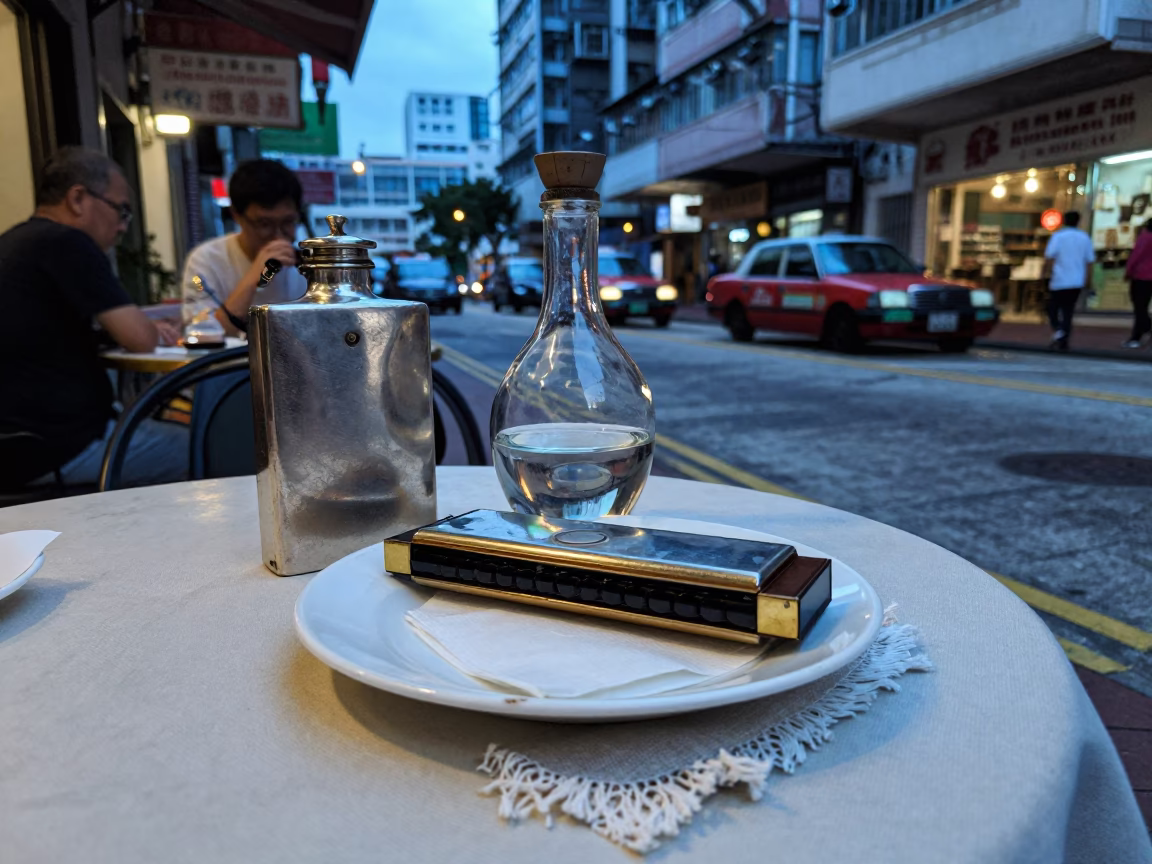 Hong Kong Evening Street Scene with Vintage Harmonica and Decanter on Cafe Table in in Hong Kong, Hong Kong