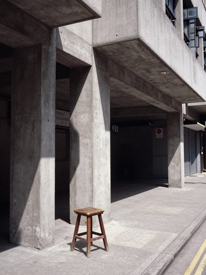 Hong Kong Midmorning Street Scene with Stool and Concrete Brutalist Architecture in in Hong Kong, Hong Kong