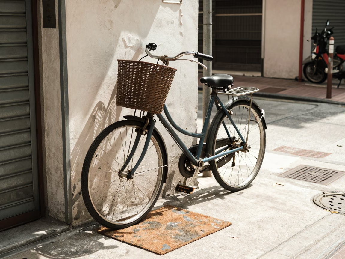 Hong Kong Noon Street Scene with Bicycle Basket and Doormat in in Hong Kong, Hong Kong