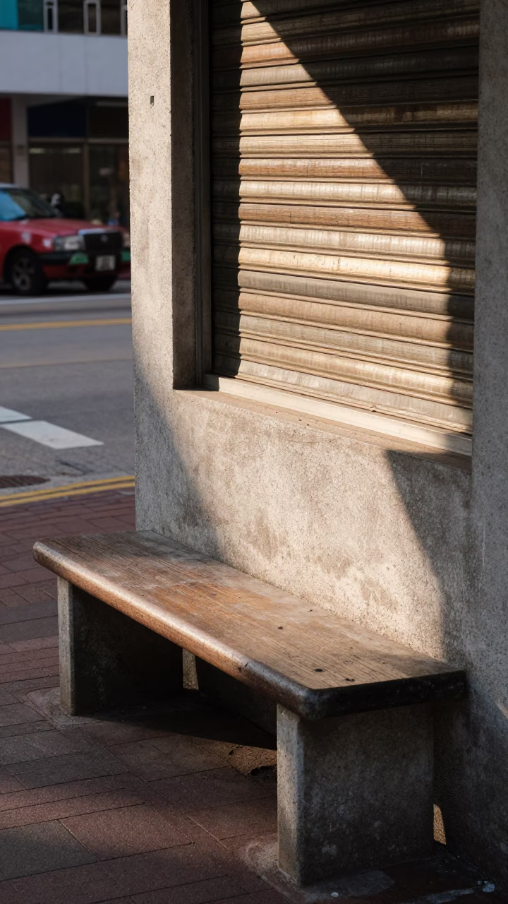Hong Kong Street Scene with Window Light on Bench Slat in Clear Late Afternoon in in Hong Kong, Hong Kong