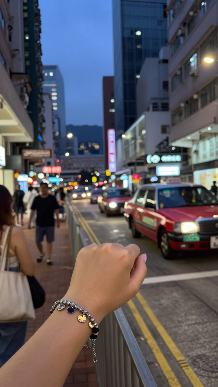 Hong Kong Twilight Street Scene with Charm Bracelet Detail and City Lights in in Hong Kong, Hong Kong