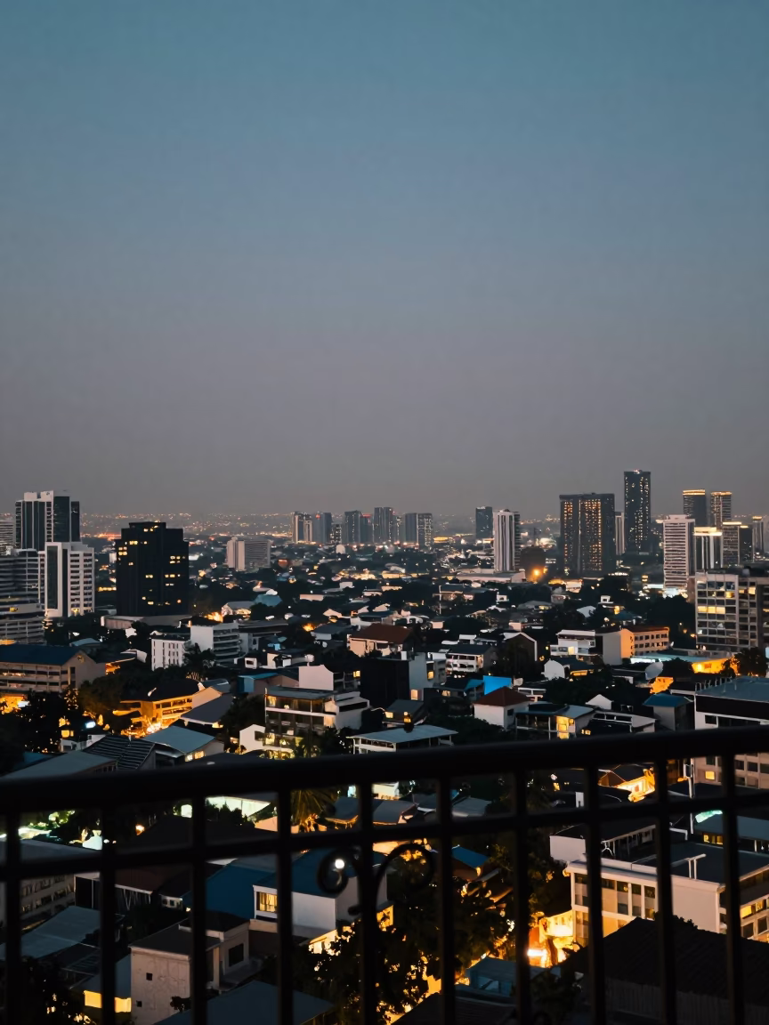 Hotel Balcony in Bangkok at As City Lights Begin To Glow in in Bangkok, Thailand