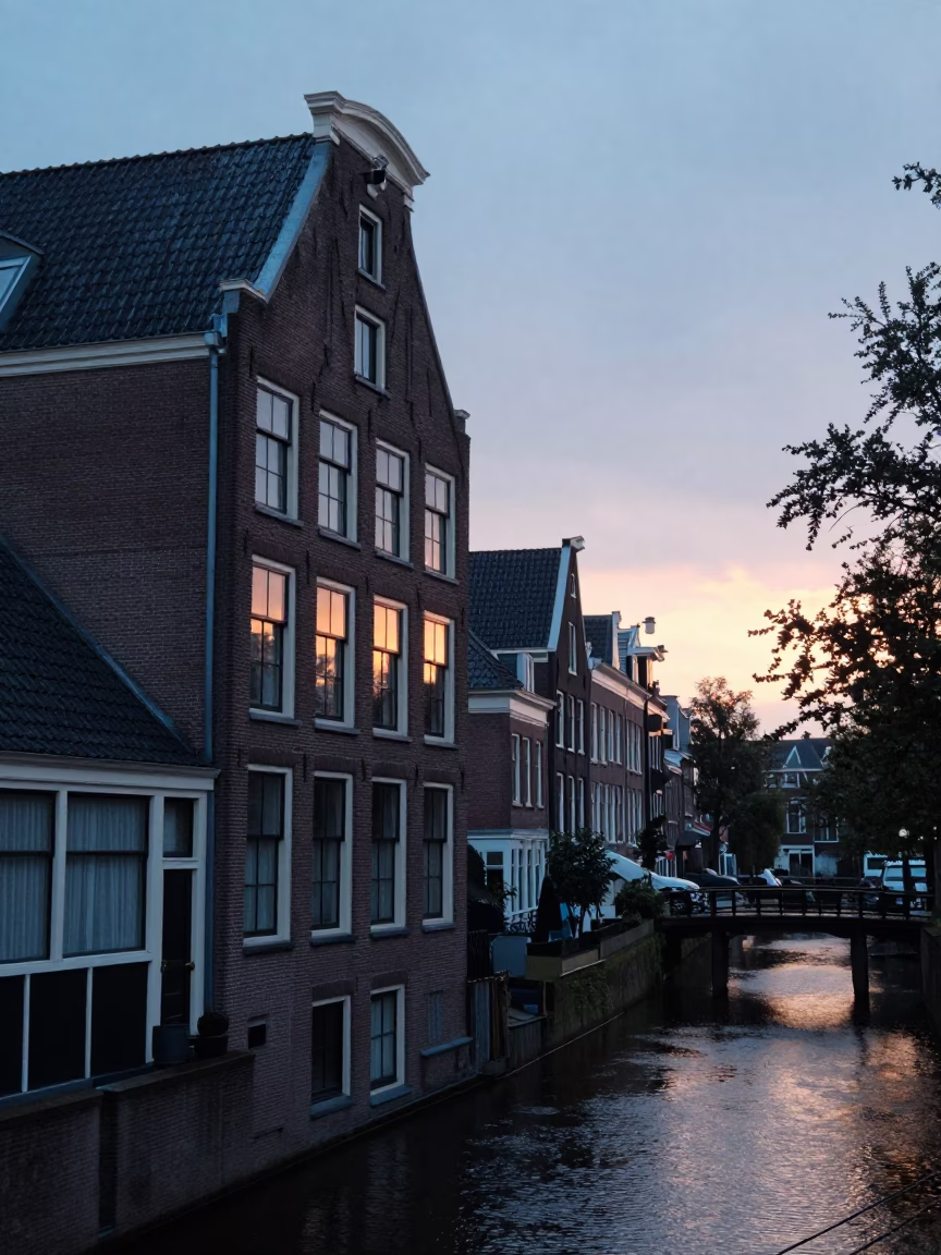 House Exterior in Amsterdam at As The Sun Drops Toward The Horizon in in Amsterdam, Netherlands