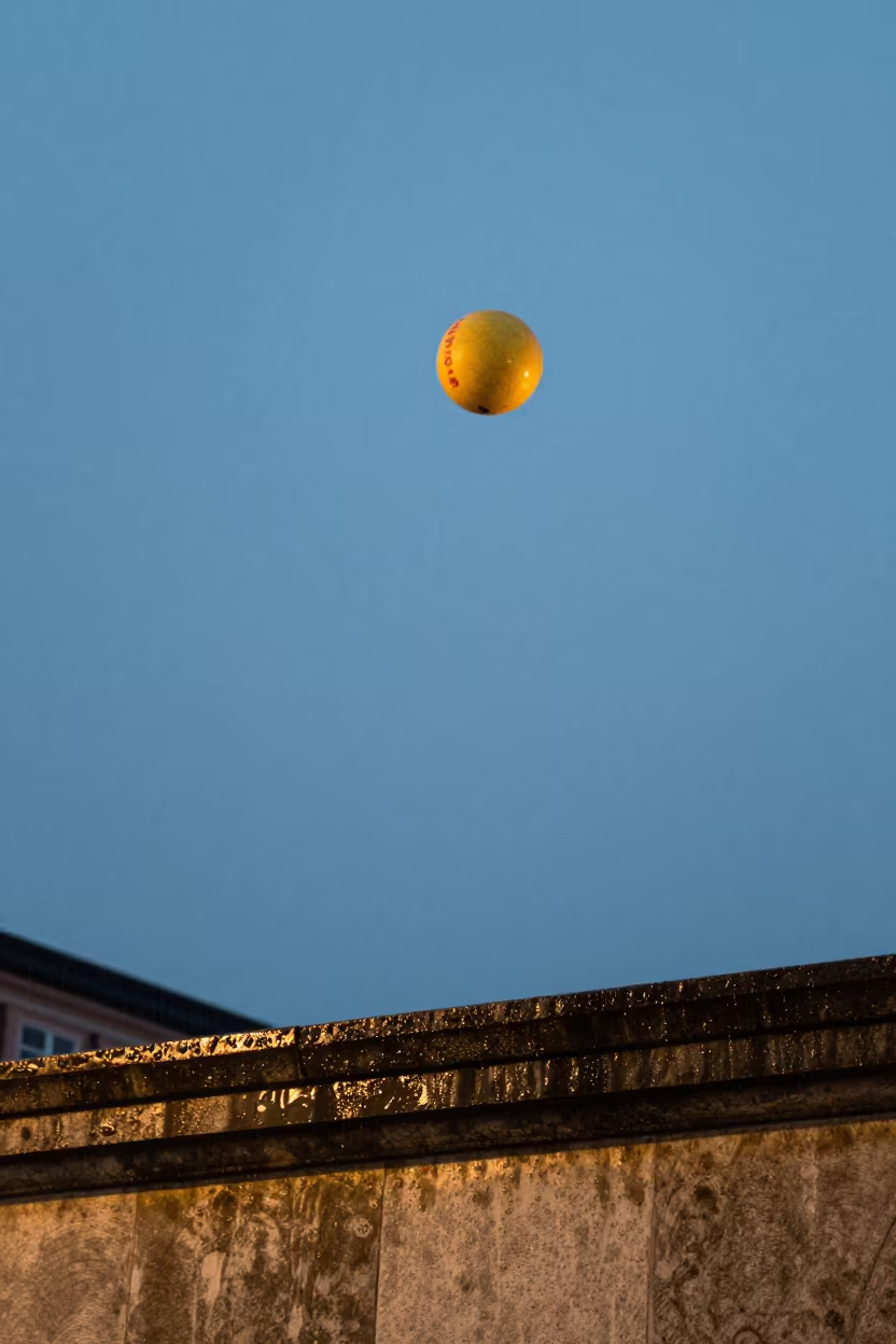 Human Cannonball Twilight Neon Ledge Munich in on a stone ledge in Viktualienmarkt, Munich
