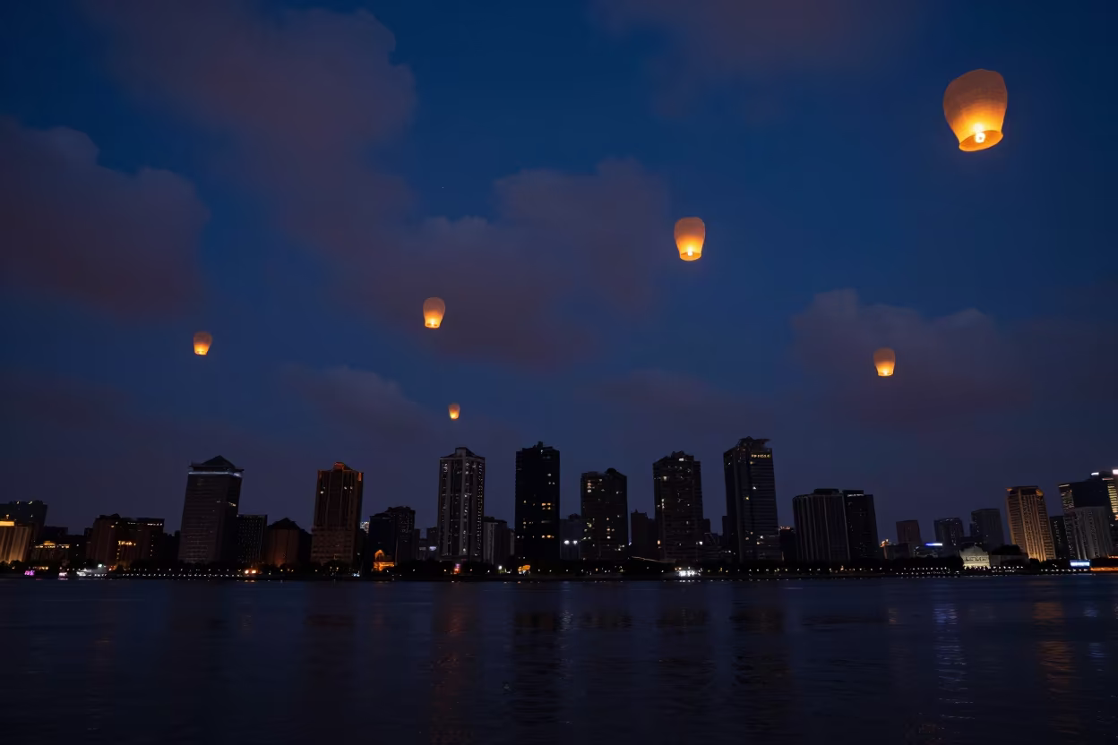 Hundreds of Sky Lanterns Rise Over Shanghai at Predawn in at a waterfront celebration in Shanghai