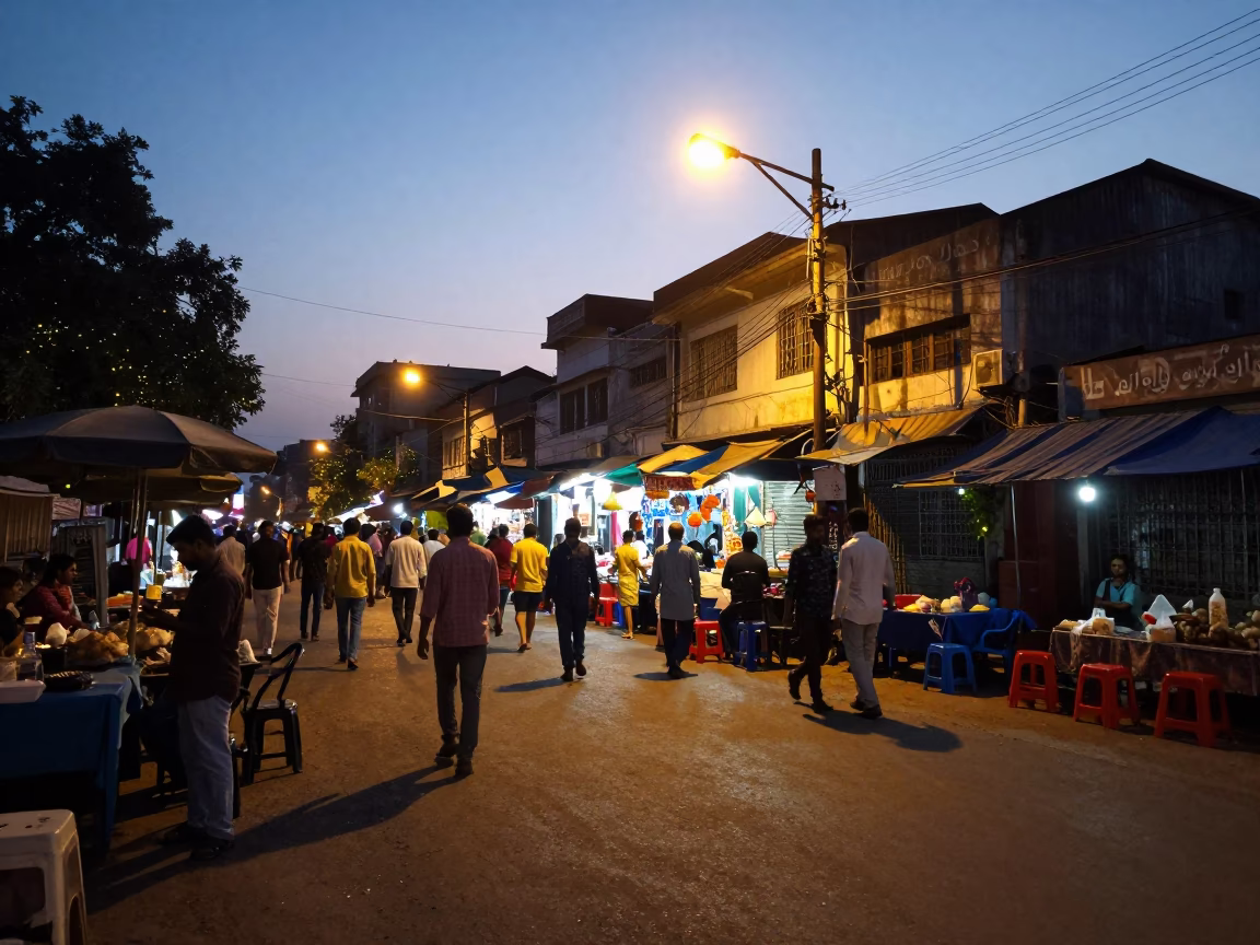 Hyderabad Evening Street Scene with Fireflies and Local Market Activity in in Hyderabad, India