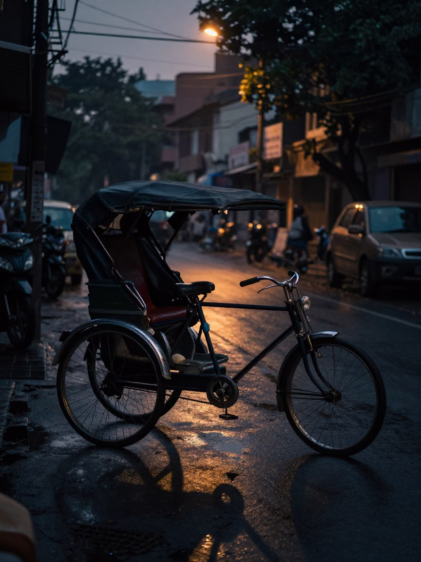 Hyderabad India predawn street scene with rickshaw in darkness in in Hyderabad, India