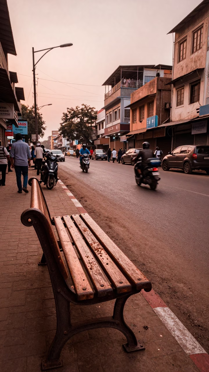 Hyderabad India Street Scene Before Dusk Copper Light with Old Bench and Lumber Transport in in Hyderabad, India