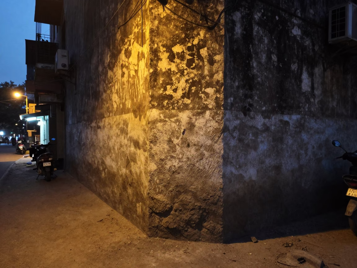 Hyderabad street scene at dusk with dust on wall and paring knife in in Hyderabad, India