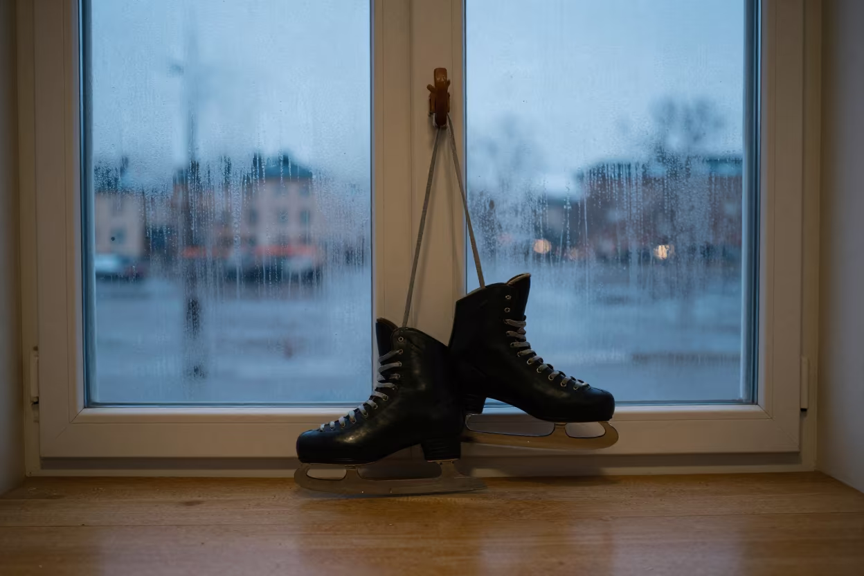 Ice Skates on Library Door Hook Stockholm in on a dusty library table in Stockholm
